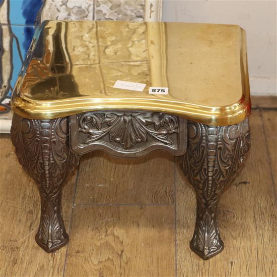 A Victorian brass and cast iron footman W.40cm